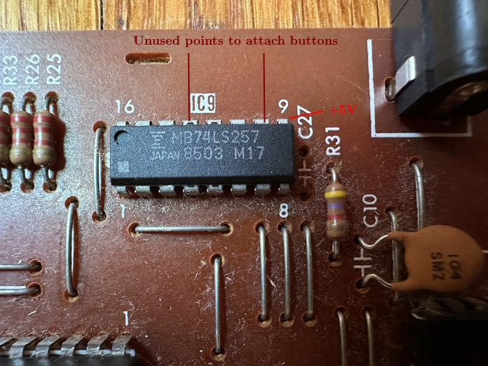 A 74LS257 with solder points noted